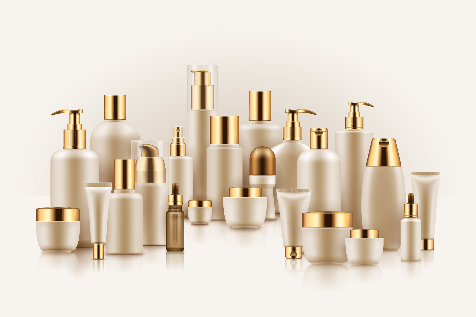 Two dozen unbranded cream-and-gold cosmetic bottles, jars, tubes and droppers grouped together, nearly indistinguishable from one another.